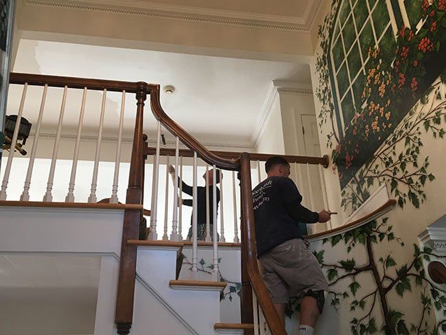 painting and detailing the interior of a house