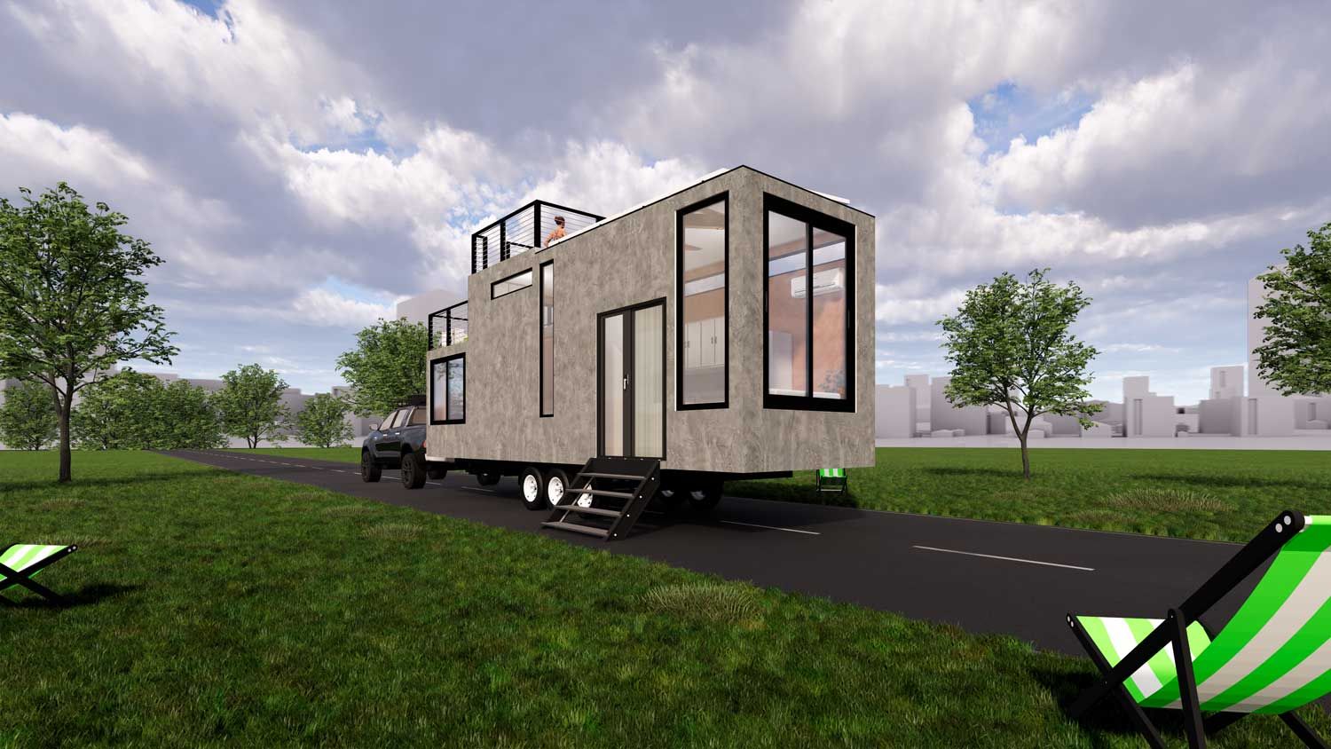 A tiny house on wheels is driving down a road.