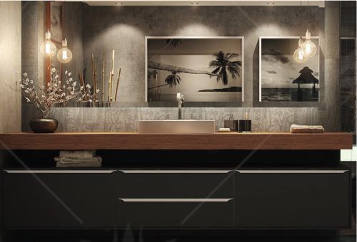 A bathroom with a sink and two pictures on the wall.