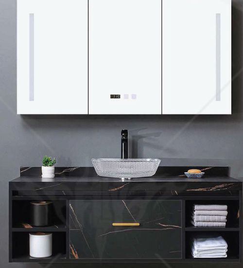 A bathroom vanity with a sink and a mirror.