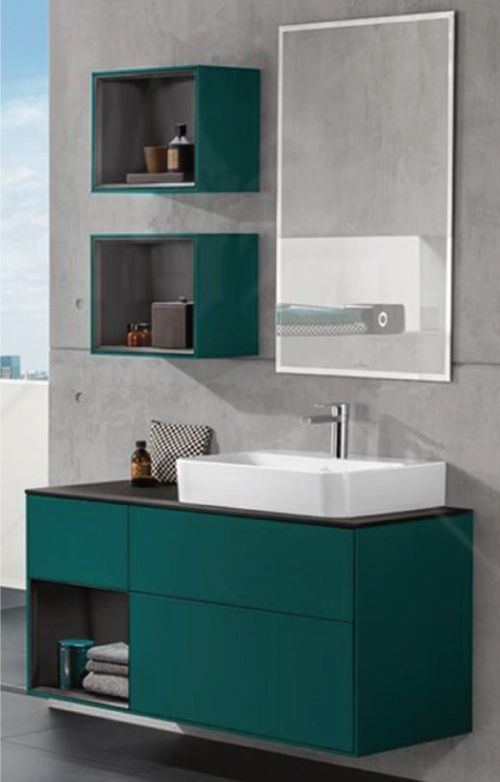 A bathroom with a sink , mirror and shelves