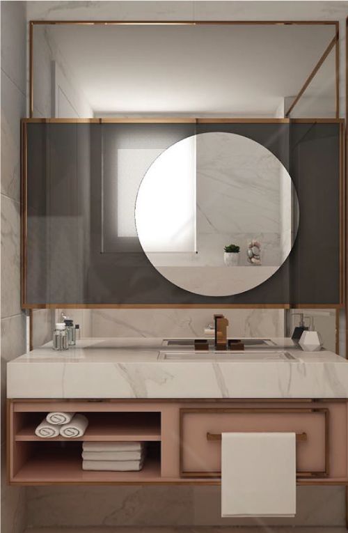 A bathroom with a sink , mirror and towels.