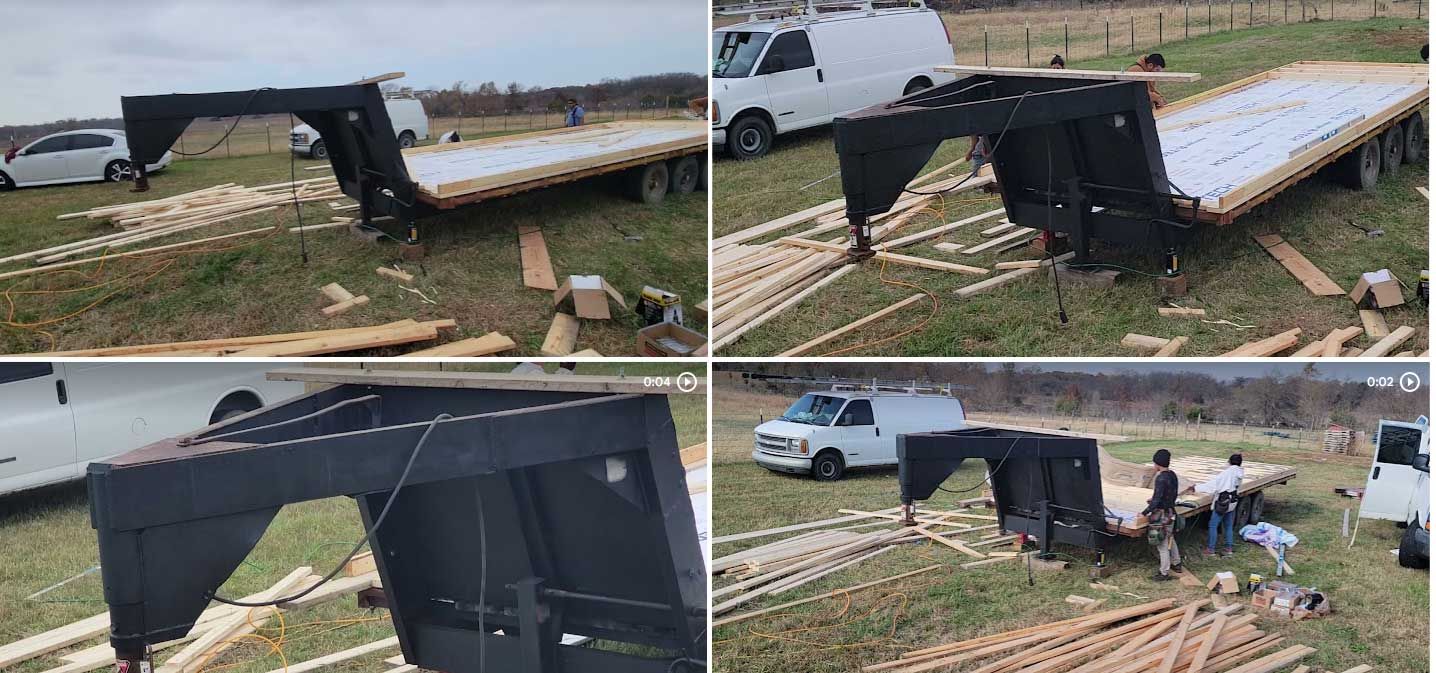 A trailer that has been damaged by a tornado is sitting in a field.