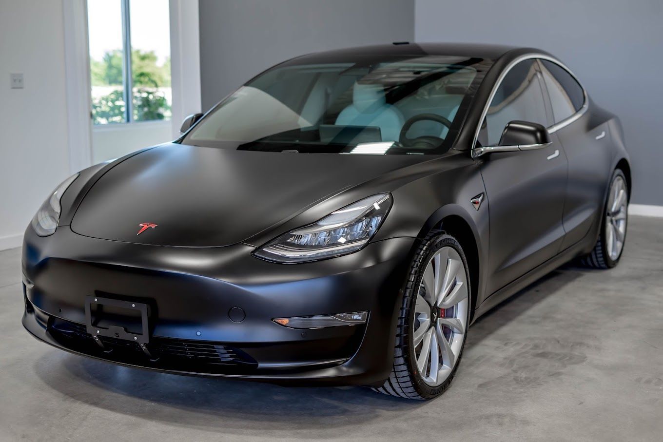 Tesla PPF car parked indoors