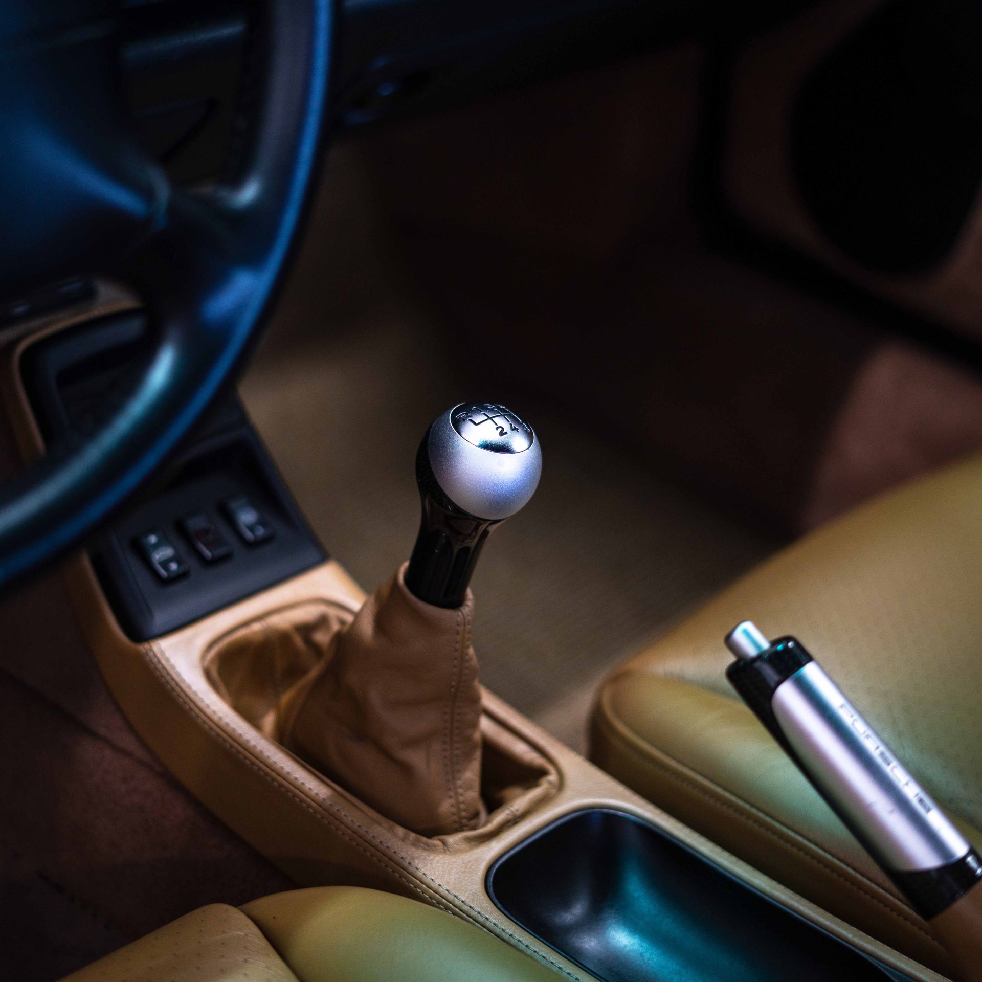 A close up of a shifter in a car