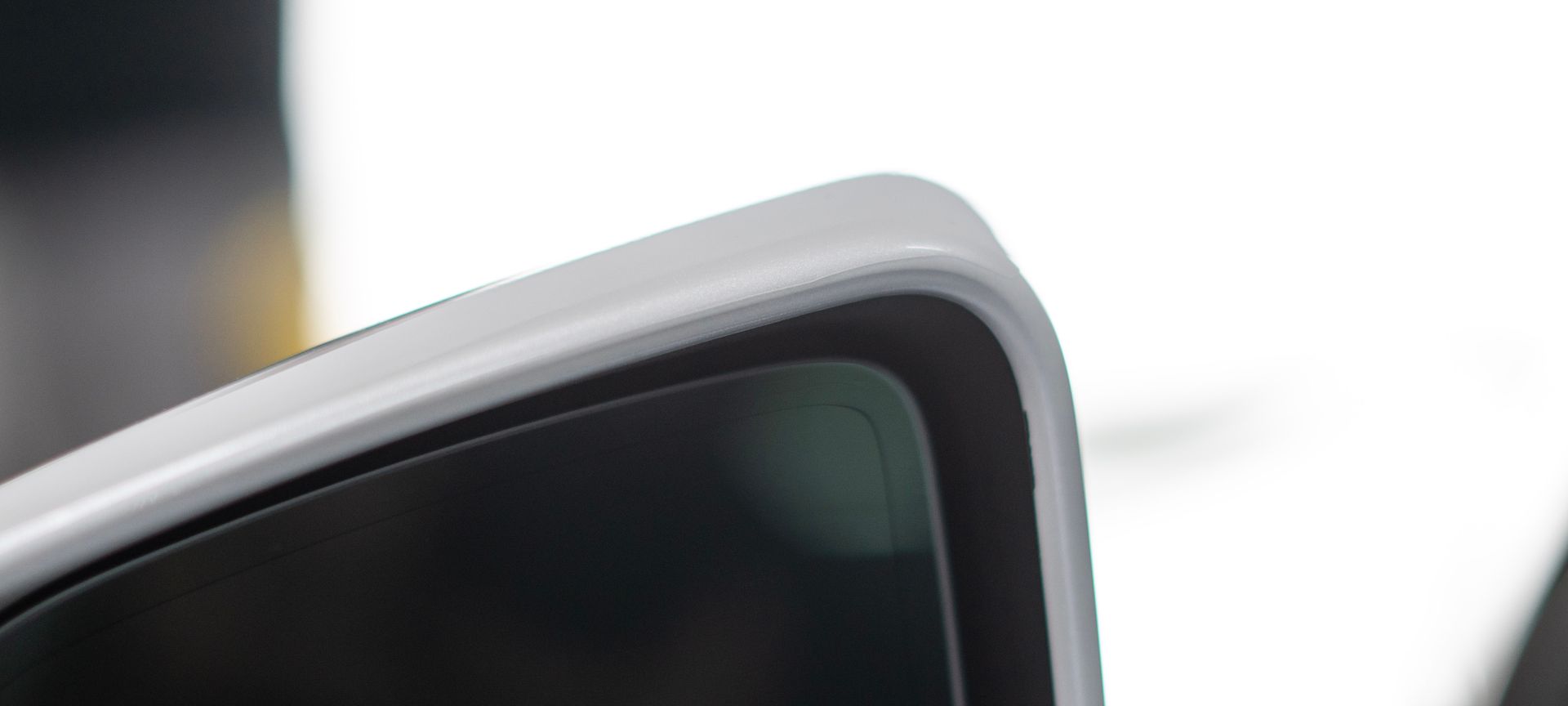 a close up of a car rear view mirror on a white background .