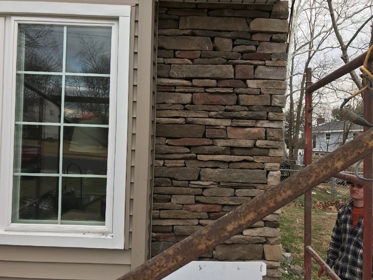 Bricklayers Beside The Window — Cinnaminson, NJ — A & M Masonry and Concrete