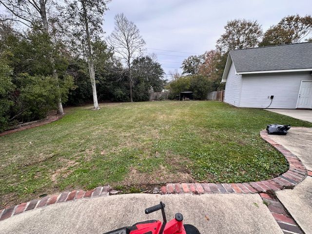 A picture of a backyard that is clean cut in Mandeville, LA.