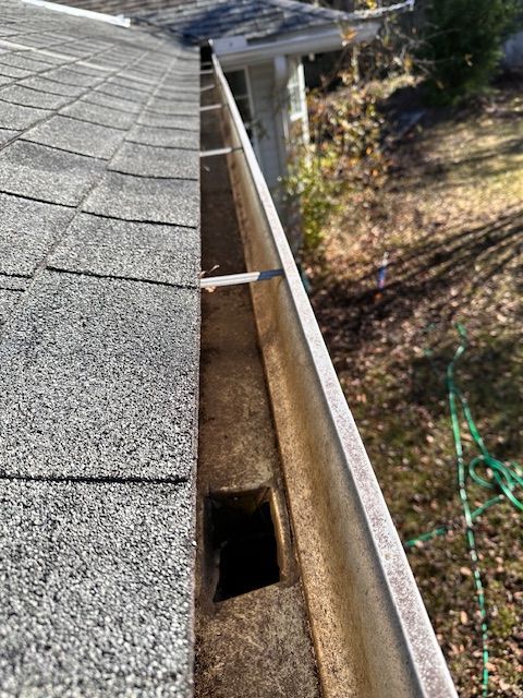 A picture of a gutter on a house.