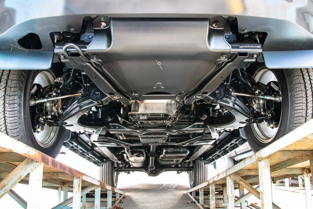 The Underside Of A Car Is Shown In A Garage — Macgregor Auto In Belconnen, ACT