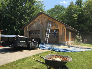 Painter Working On The Garage — Lyons Falls, NY — WPC