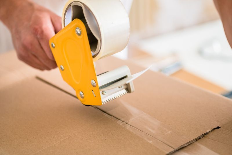 Sealing a Box with Tape — Oakland Park, FL — Atlantic Paper & Packaging