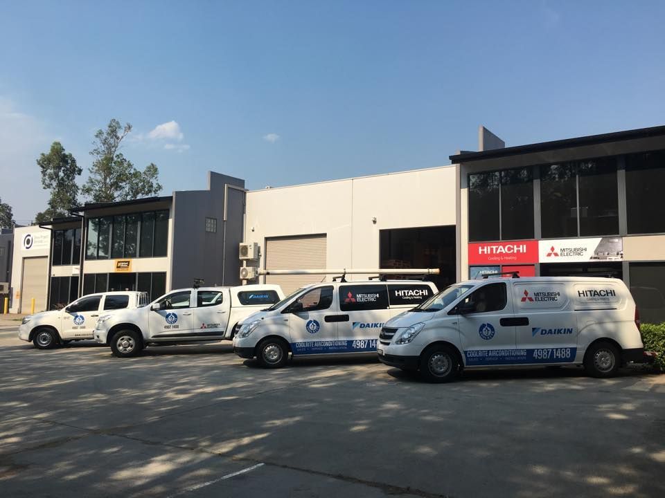 Building with Vehicle Parked In Front — Split System Air Conditioning Hunter Valley