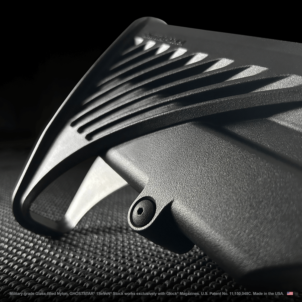 A close up of a black object with a hole in the middle