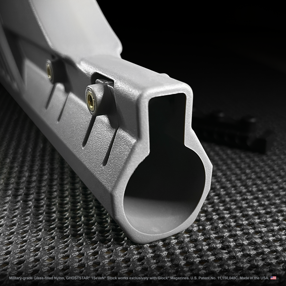 A close up of a gray object with a hole in the middle