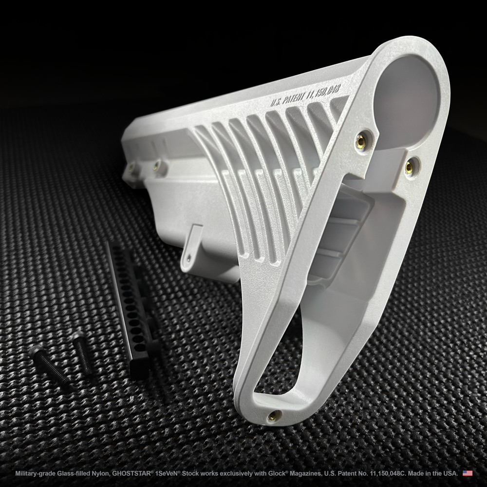 A close up of a white item on a black surface