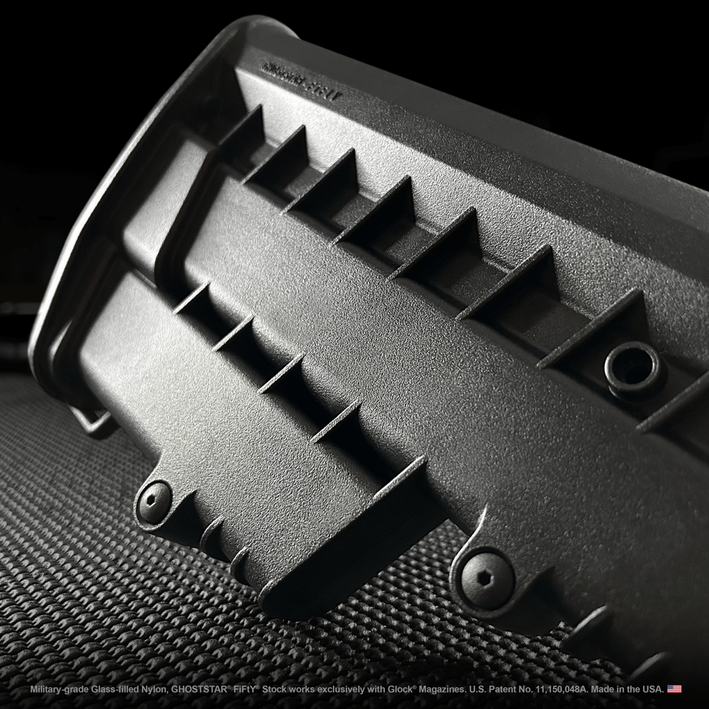 A close up of a black object with holes in it