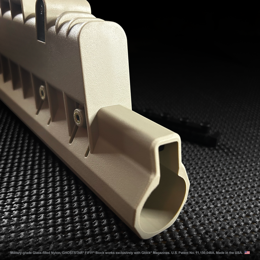 A close up of a piece of plastic on a black surface