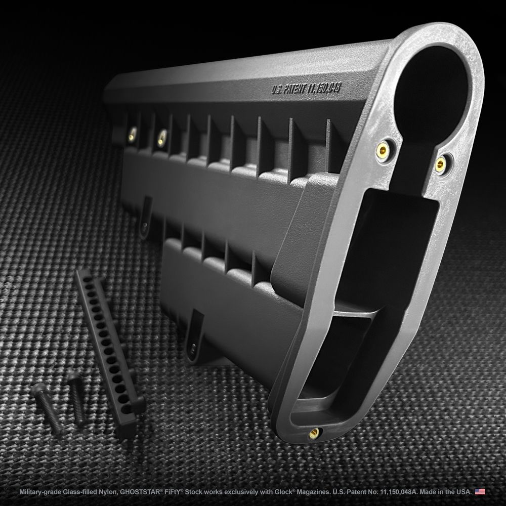 A close up of a black item that says ' american made ' on it