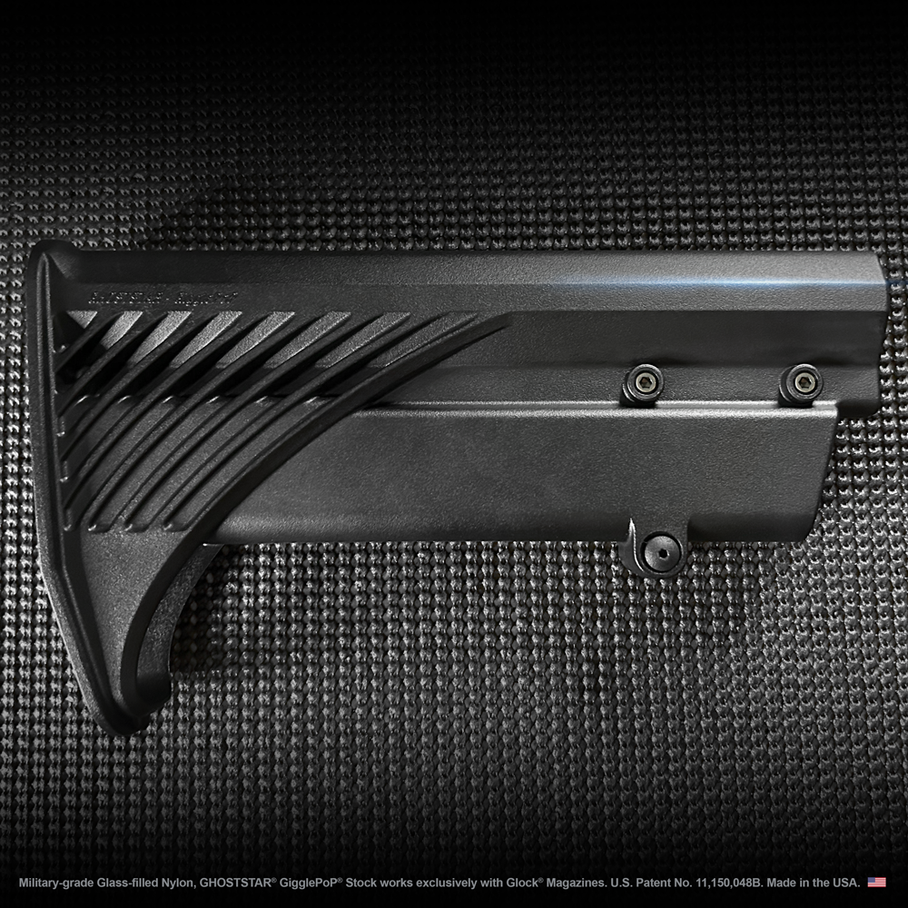 A close up of a black item on a black surface