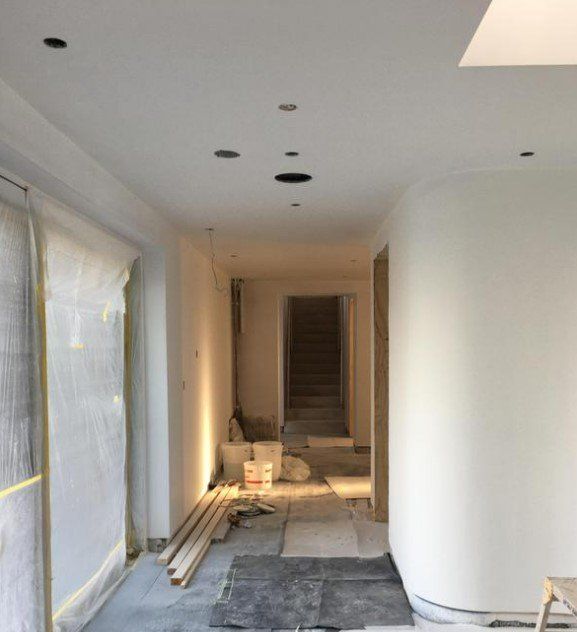 Picture of a domestic hallway painted in white by painters and decorators Liverpool