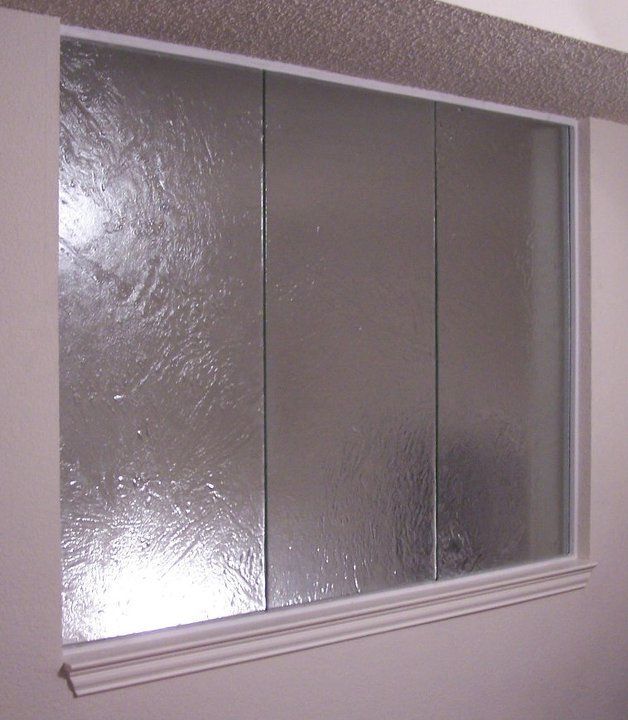 A window with a white frame and clear glass