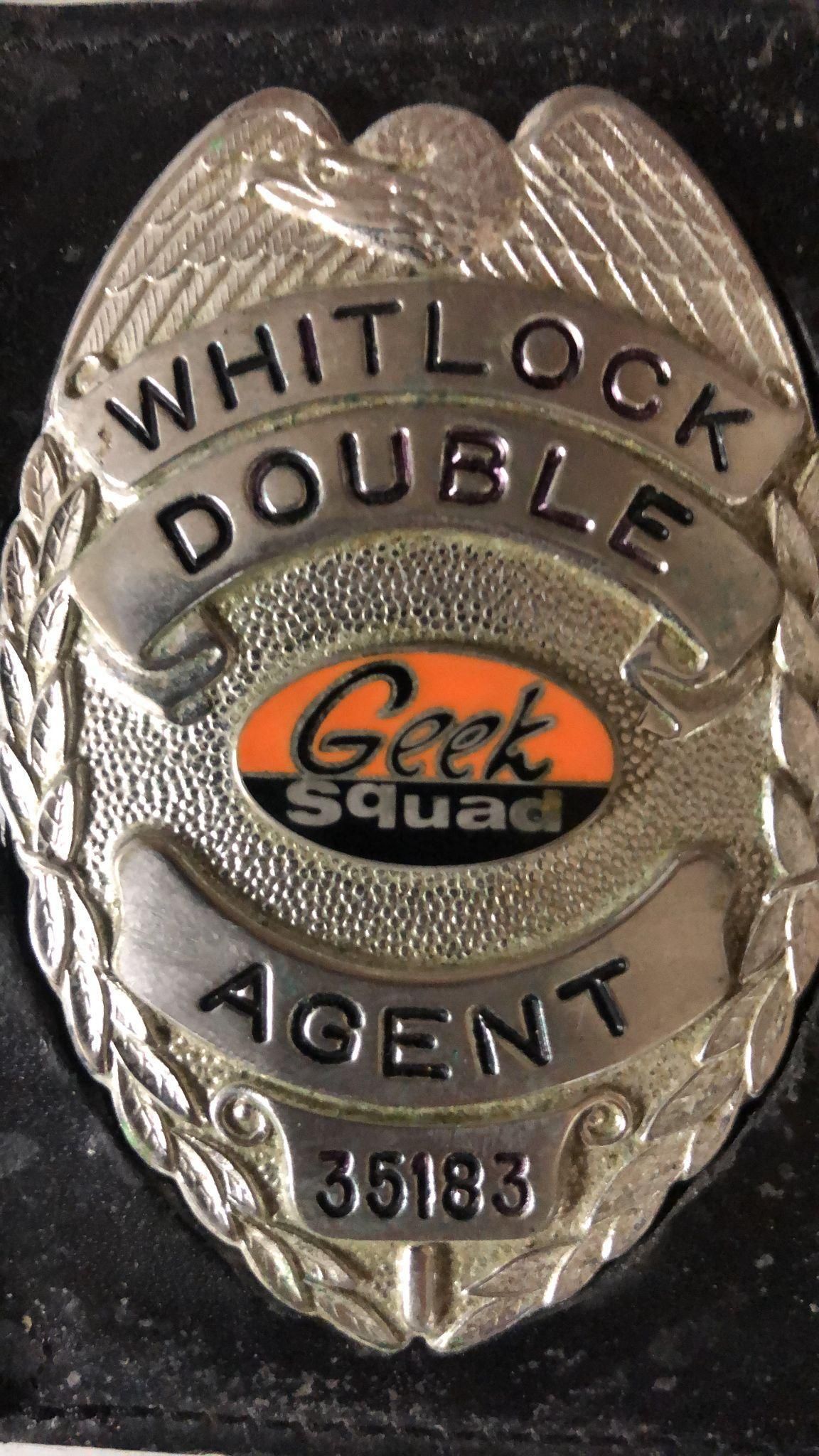 Silver Geek Squad agent badge with the name