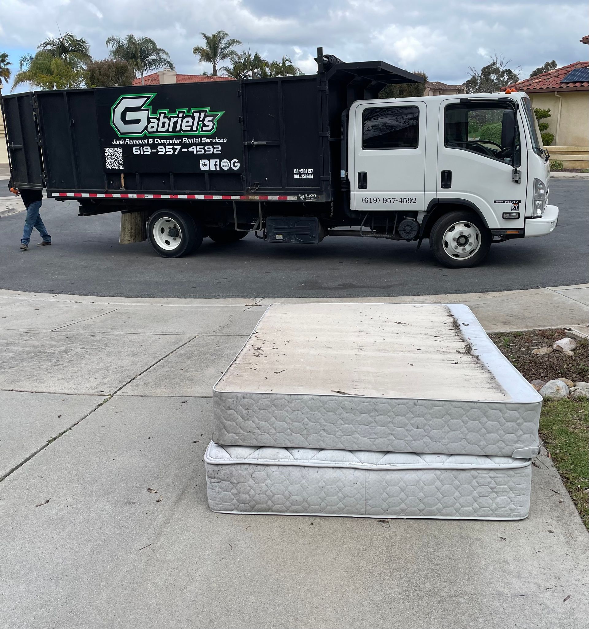 A gabriel 's truck is parked on the side of the road