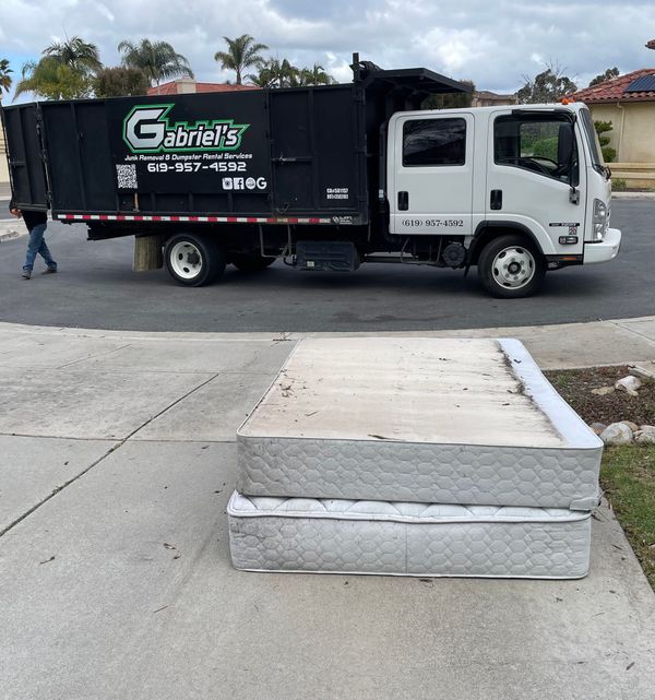 A gabriel 's truck is parked on the side of the road