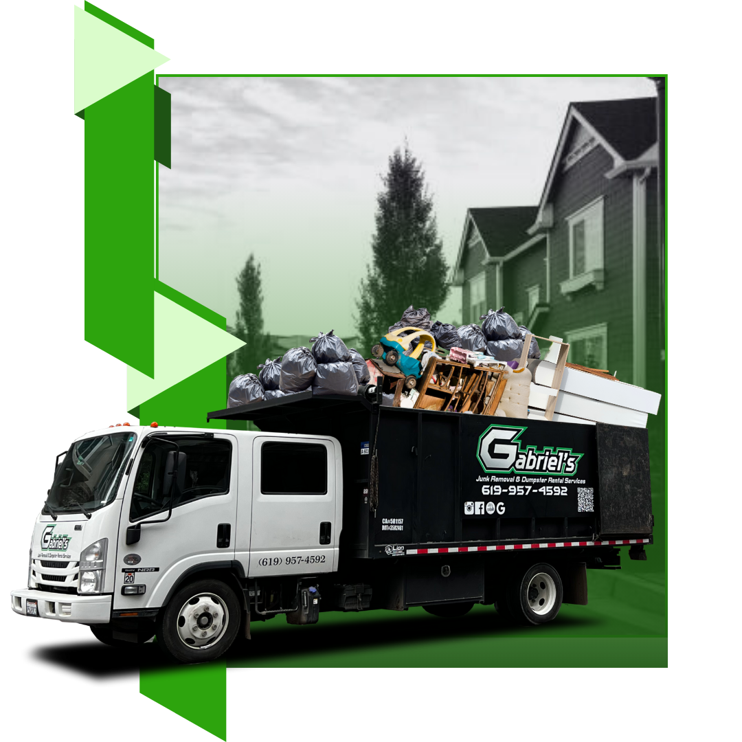 A garbage truck is full of garbage in front of a house.