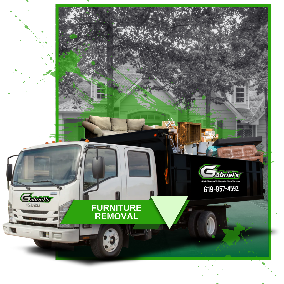 A garbage truck filled with furniture is parked in front of a house.