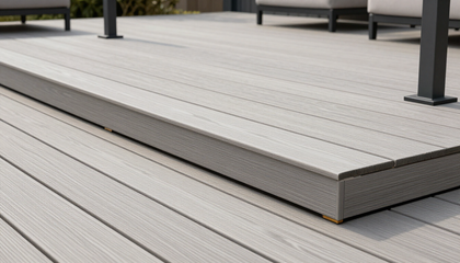 “Detailed view of light gray composite decking with a clean modern finish by deck builders in Hartford, CT”