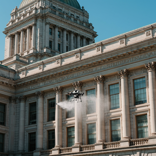 STRATOCLEAN USING A DRONE TO DELICATELY CLEAN A  OLD GOVERNMENT BUILDING 