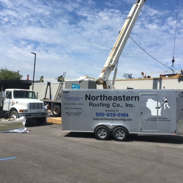 A Photo Of Trucks — Seymour, WI — Northeastern Roofing Company