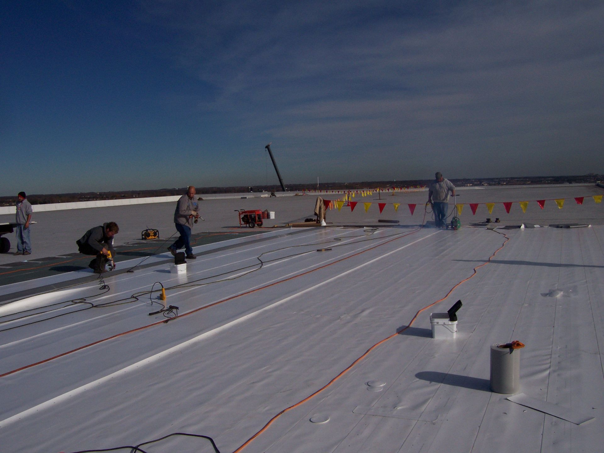 Workers Fixing Roof — Seymour, WI — Northeastern Roofing Company