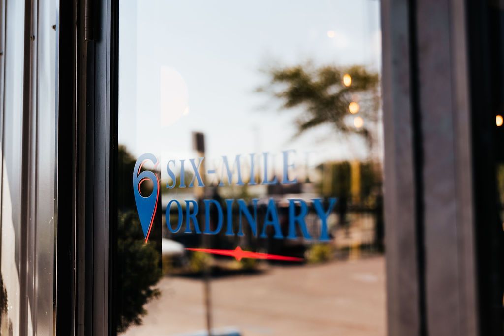 The Front Door Presenting the Logo to Six-Mile Ordinary in Columbia, MO.