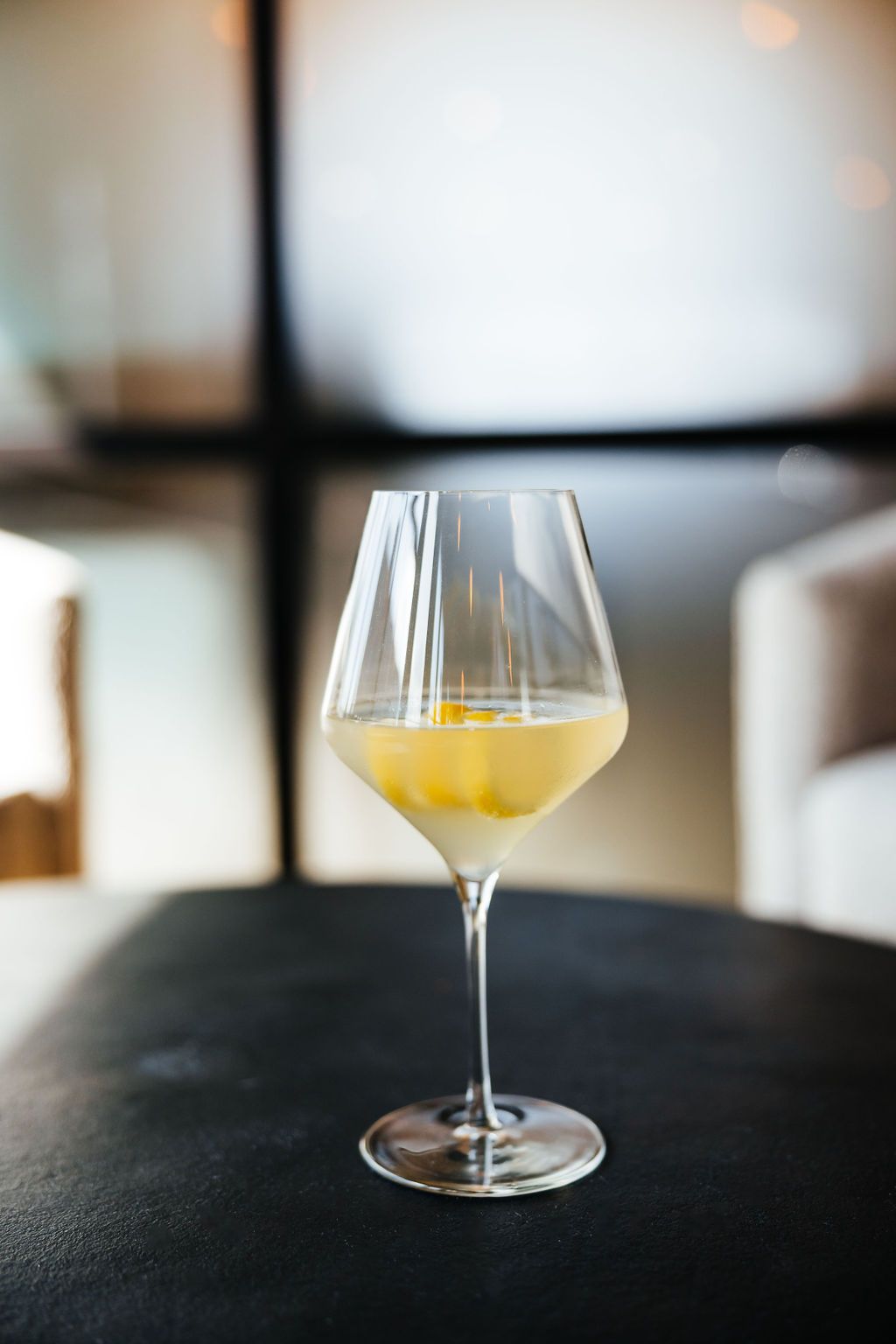 Order a Refreshing French 75 at Six Mile Ordinary in Columbia, MO.