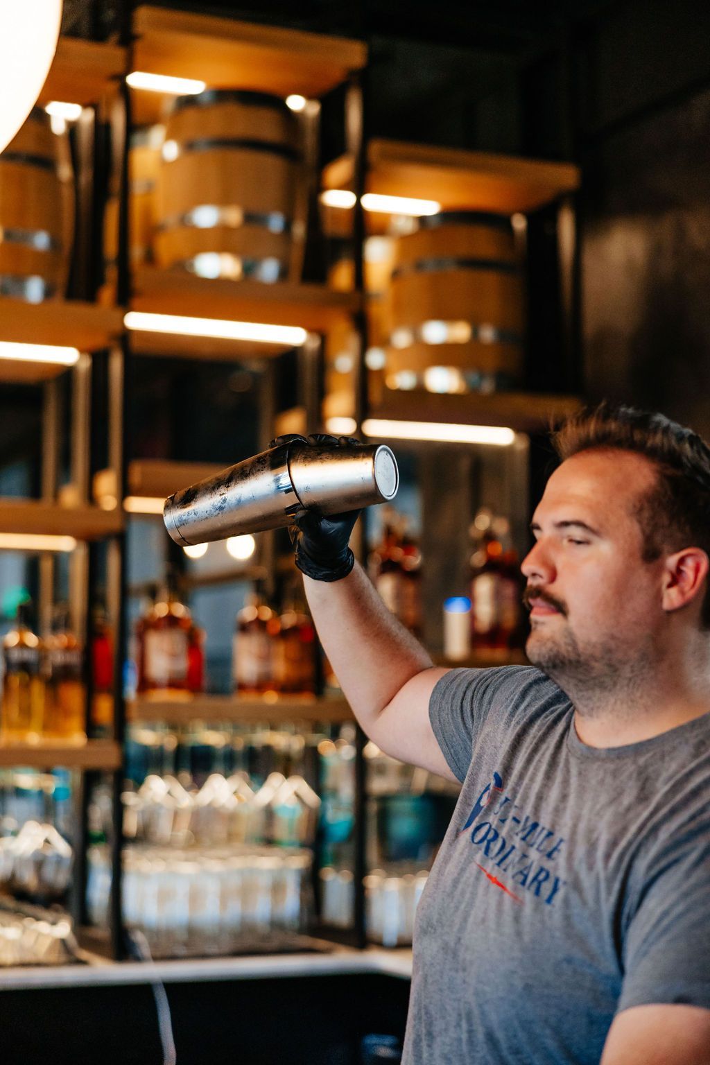 A Bartender Shaking a Drink at Six-Mile Ordinary in Columbia, MO.
