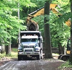 Placing septic system in ground — Septic Contractors in Hampton, NJ