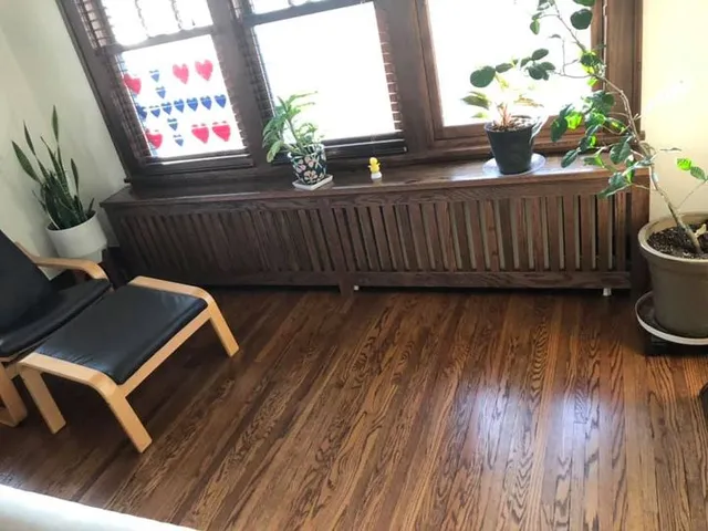 Cabinet With Radiator Covers And Wooden Floor — Minneapolis, MN — Craftsman Radiator Covers