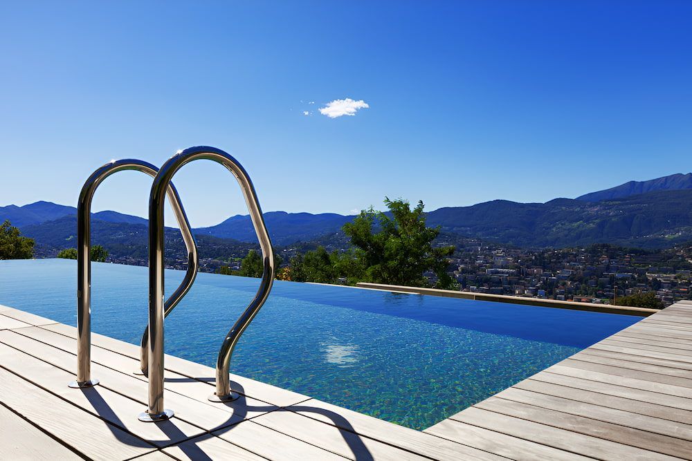 A Swimming Pool Filled With Water With Stairs Leading To It — LTR Water Deliveries In Wamuran, QLD