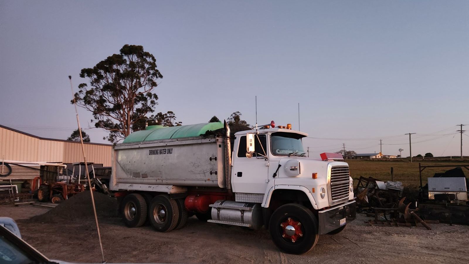 A Water Truck Is Parked On The Side Of The Road — LTR Water Deliveries In Wamuran, QLD