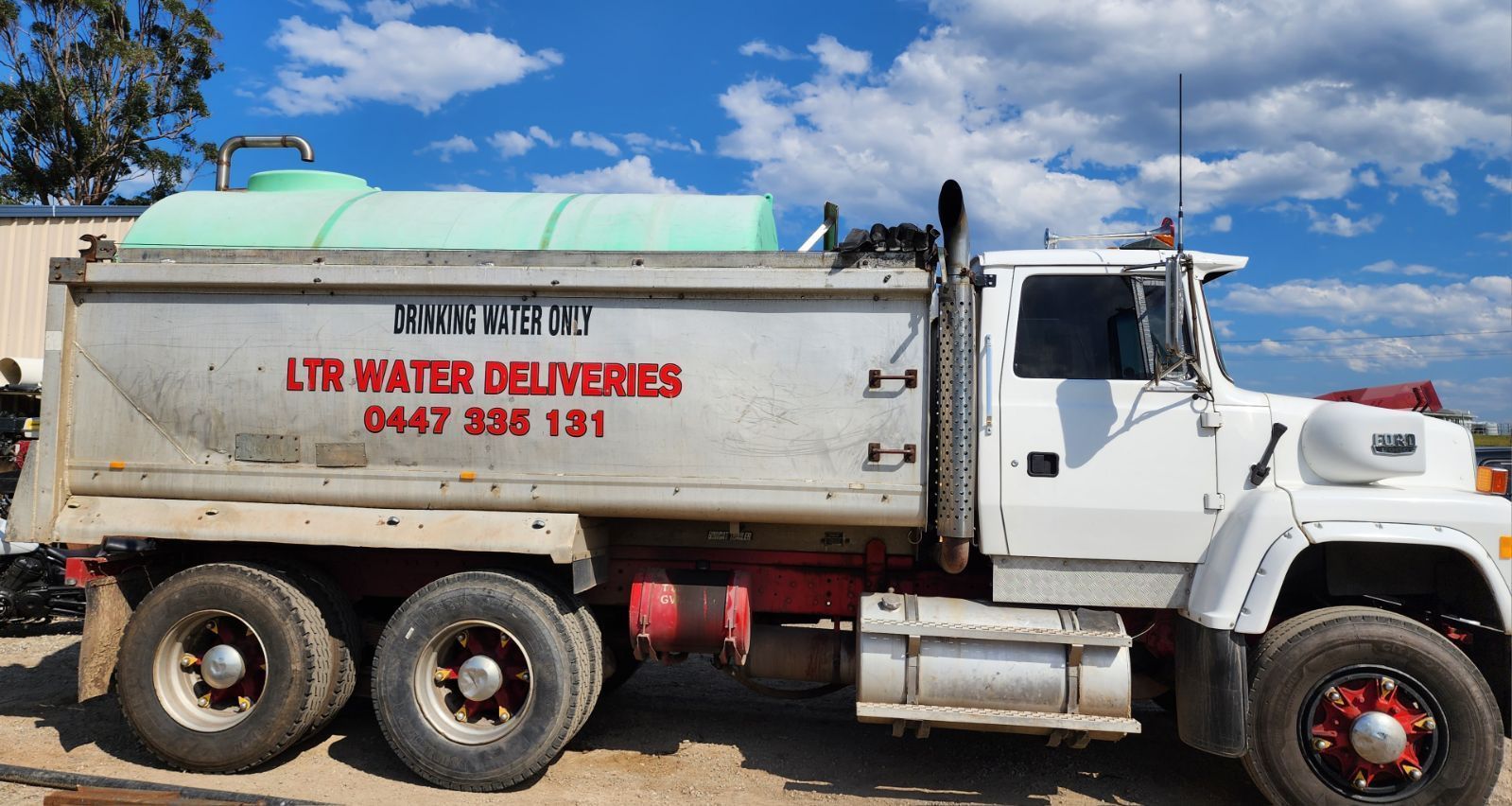 A Truck Delivering Residents With Water — LTR Water Deliveries In Wamuran, QLD