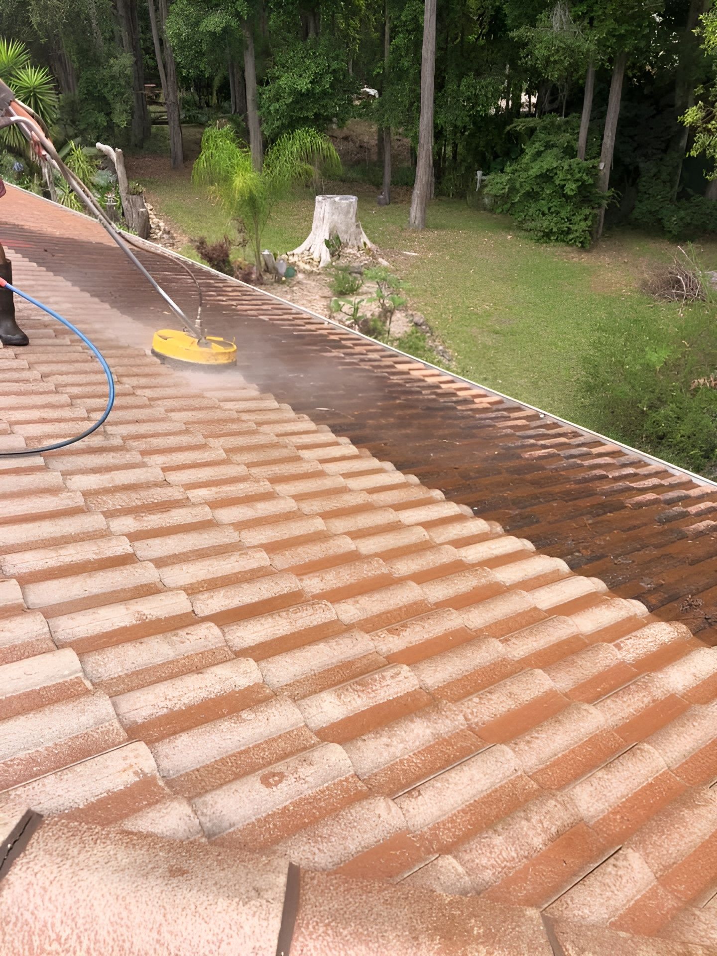 Power Washer Cleaning a Terracotta Tile Roof — Geoff Hall Roofing in Port Macquarie, NSW