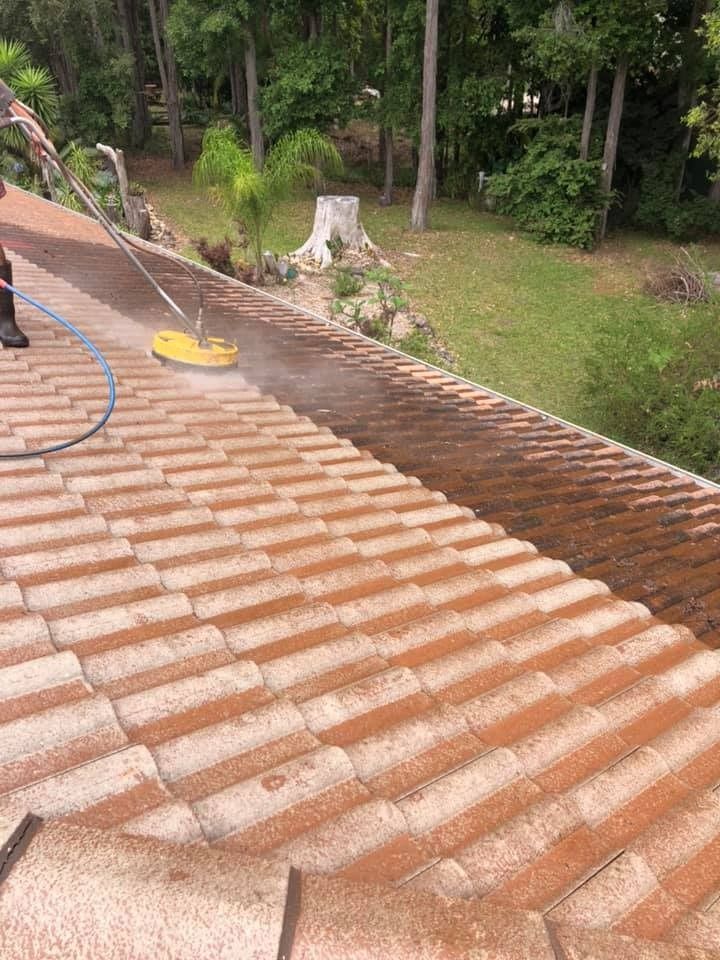 Cleaner Using Pressure Washer to Clean Roof