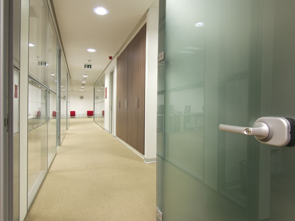 Office Hallway With Glass Walls — EBS NQ Electronic Building Systems in Kirwan, QLD