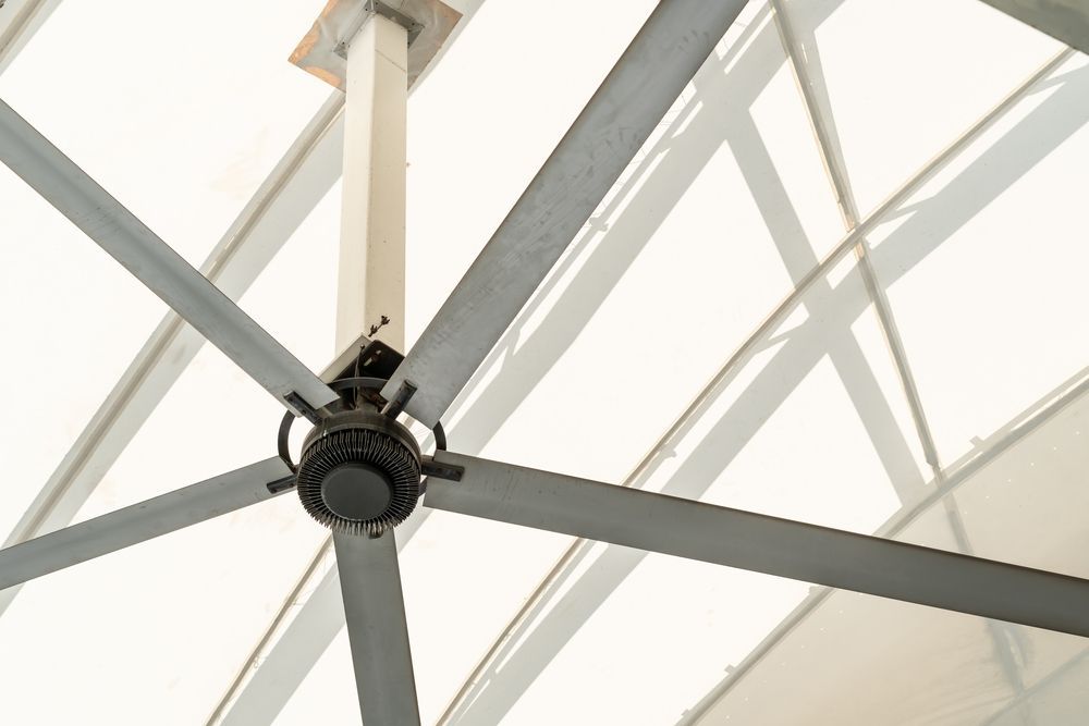 Large Industrial Ceiling Fan With Long Gray Blades — EBS NQ Electronic Building Systems in Kirwan, QLD