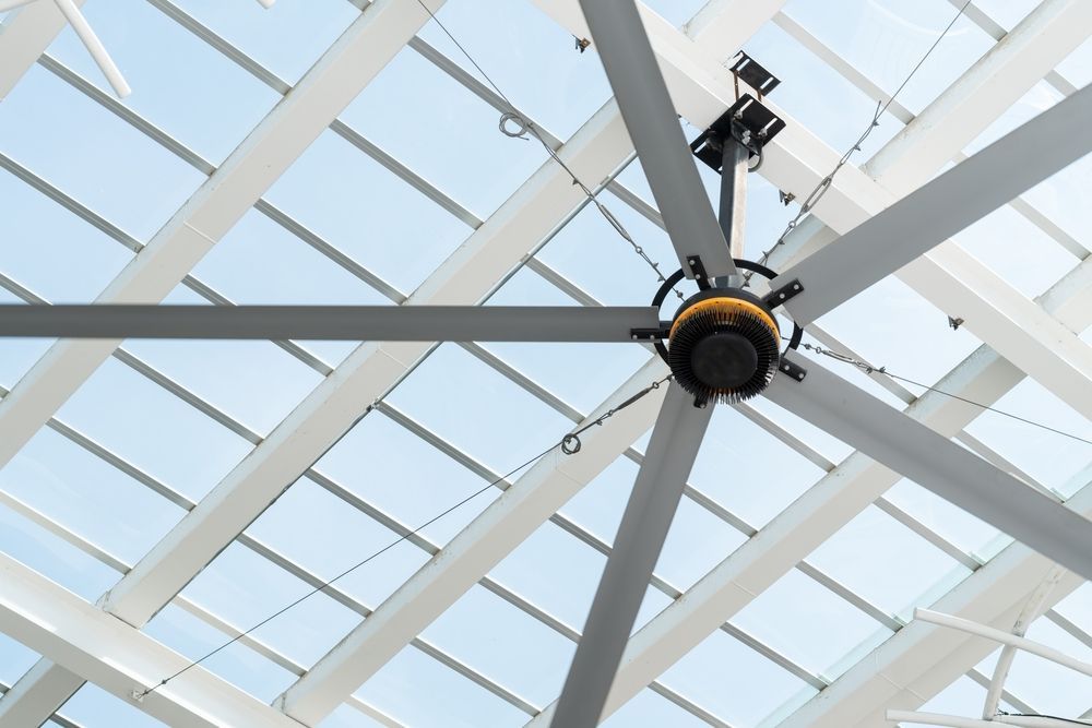 Large Industrial Ceiling Fan With Long Gray Blades — EBS NQ Electronic Building Systems in Kirwan, QLD