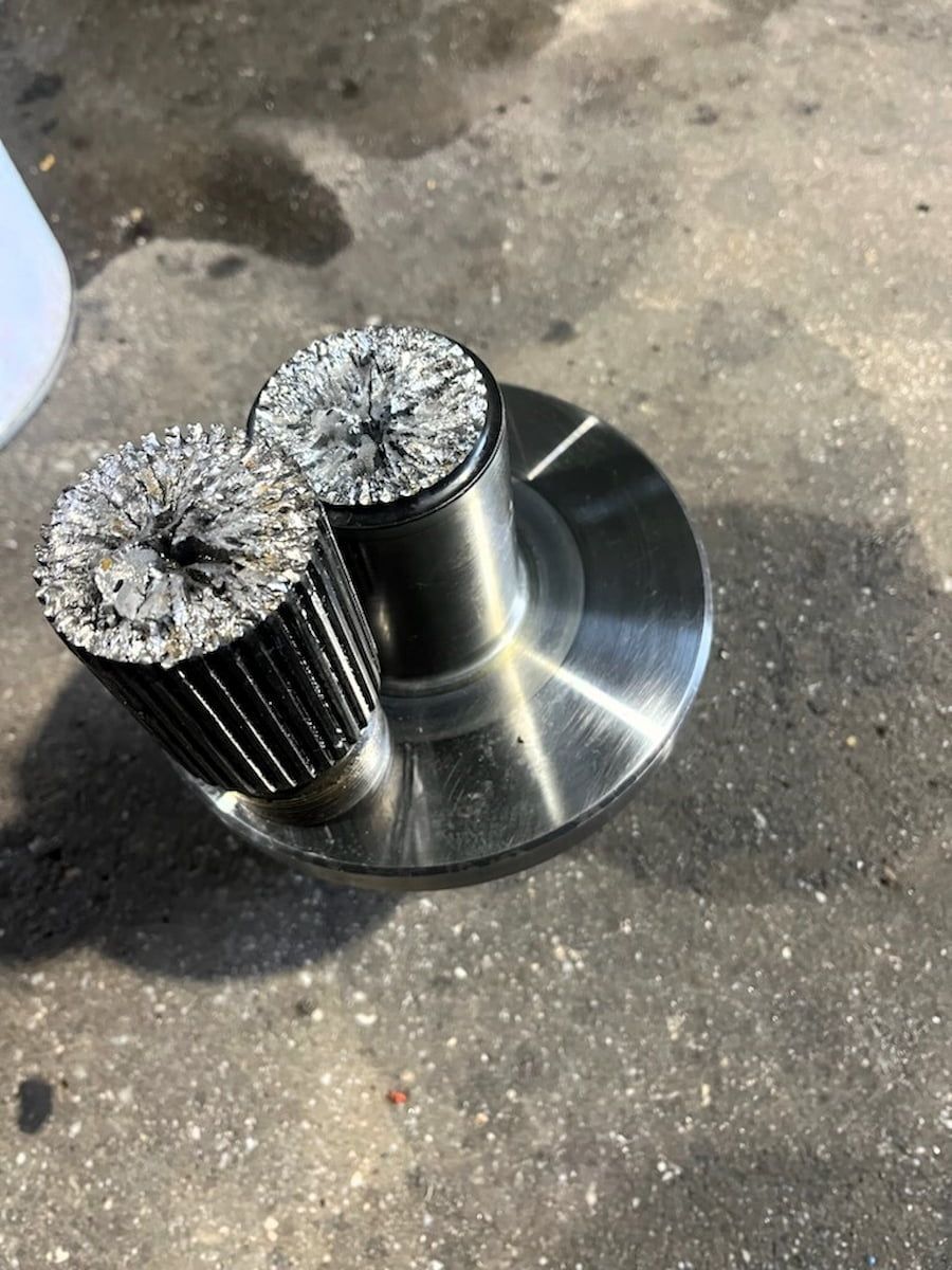 A Close Up Of A Metal Object On A Concrete Surface — Wyatt Mechanical Pty Ltd In Wodonga, VIC