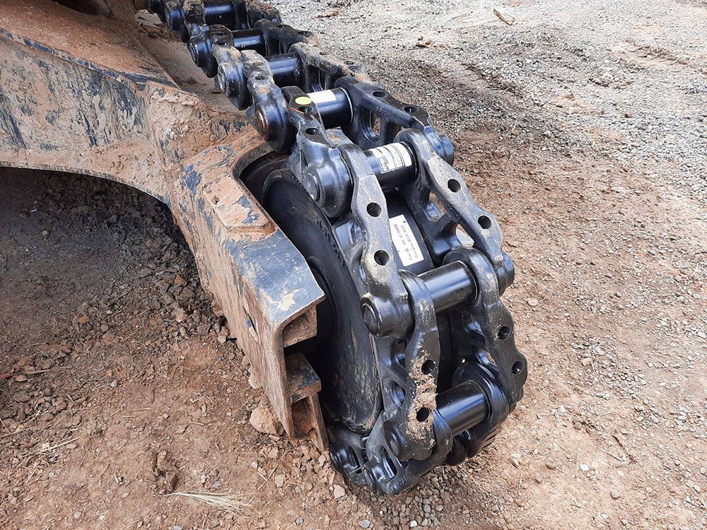 Close-Up Of A Dark, Heavy-duty Excavator Track System — Wyatt Mechanical Pty Ltd In Wodonga, VIC